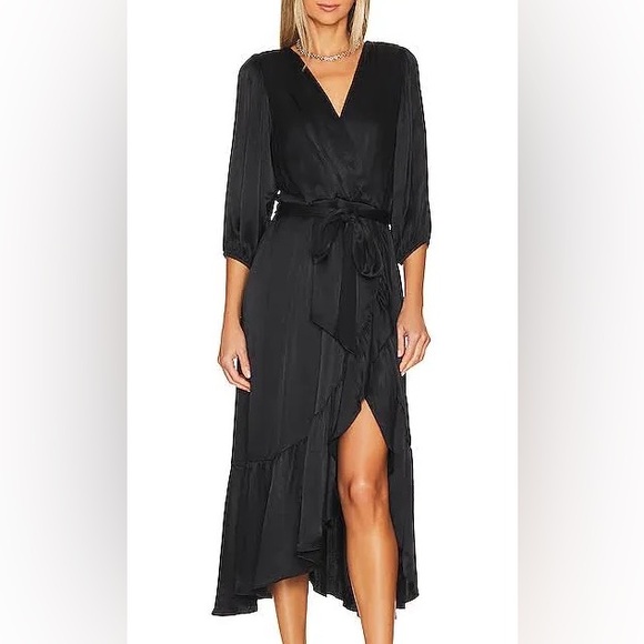 Luna Luz Dresses & Skirts - Luna Luz silk blend stunning black wrap around dress silk blend.Founded in Spain